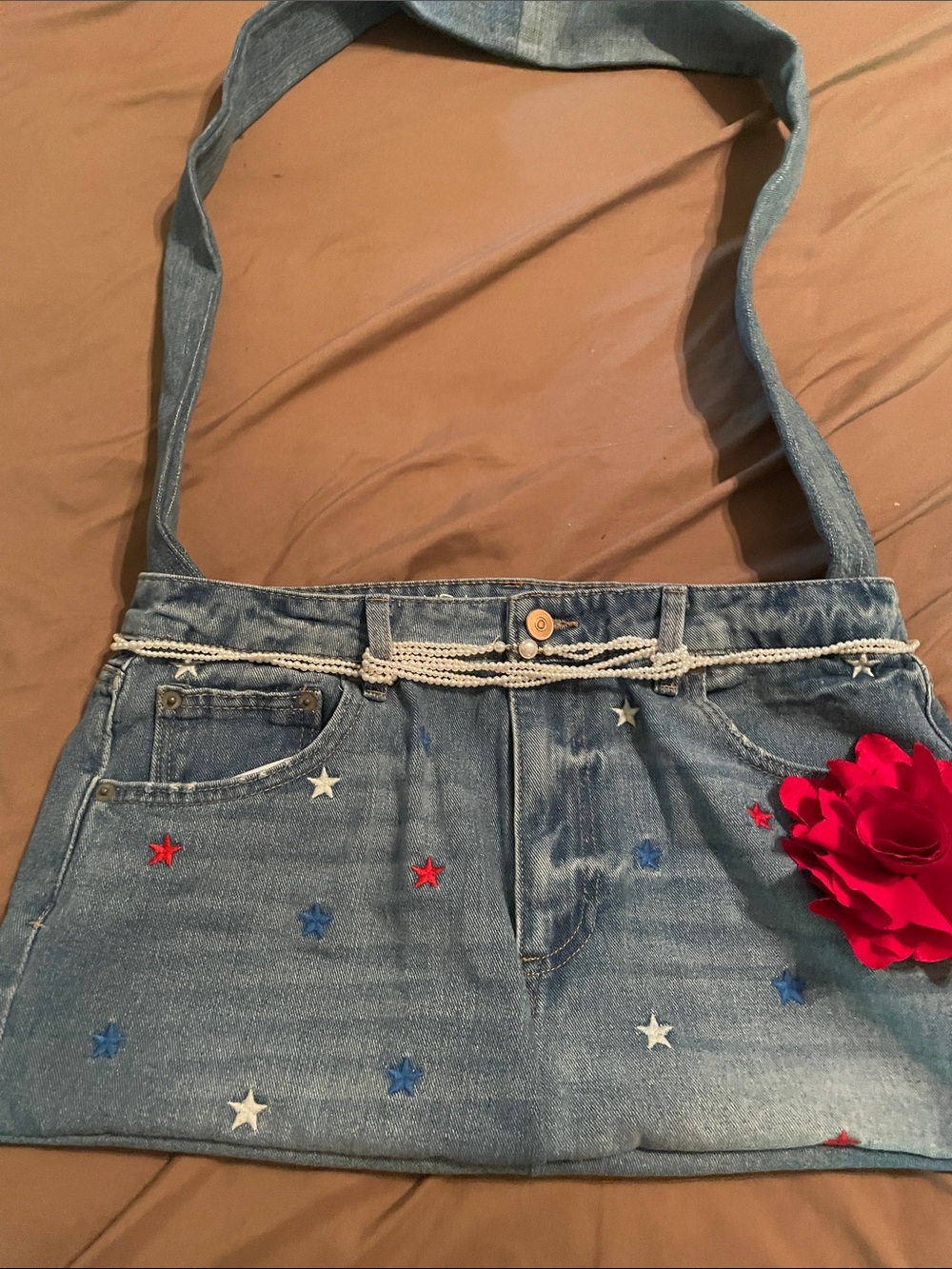 Handmade patriotic denim crossbody bag. Faux pearl and rose accents 10x18